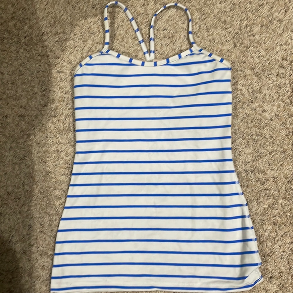 Lululemon Power Y tank. Light marks of wear as shown in photos.